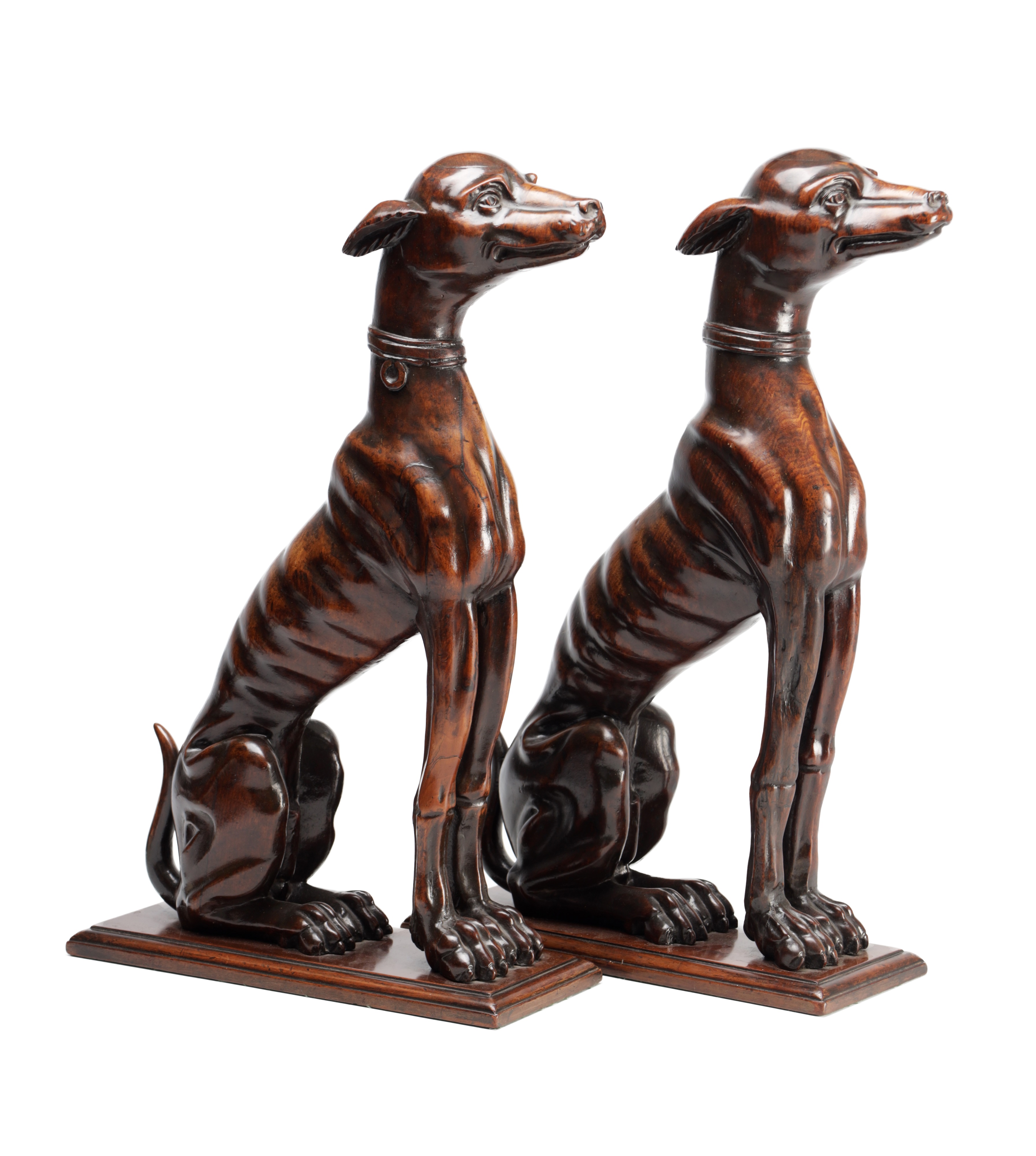 Pair of eighteenth-century carved walnut heraldic greyhound figures sold by Hutchinson Scott