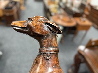 Lot 992 - A FINE PAIR OF 18TH CENTURY CARVED WALNUT HERALDIC GREYHOUND FIGURES