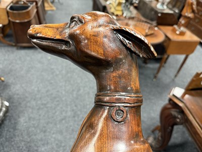 Lot 992 - A FINE PAIR OF 18TH CENTURY CARVED WALNUT HERALDIC GREYHOUND FIGURES