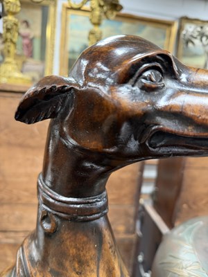 Lot 992 - A FINE PAIR OF 18TH CENTURY CARVED WALNUT HERALDIC GREYHOUND FIGURES