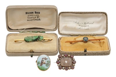 Lot 295 - A COLLECTION OF FOUR 9CT GOLD BROOCHES INCLUDING A VICTORIAN GARNET AND PEARL MOURNING BROOCH