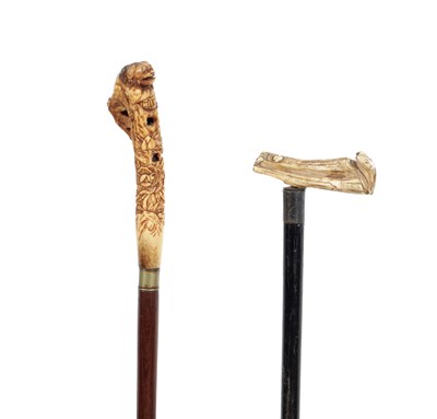 Lot 865 - TWO MEIJI PERIOD JAPANESE CARVED BONE HANDLED WALKING CANES