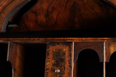 Lot 1539 - A GEORGE I BURR WALNUT BUREAU BOOKCASE WITH BROKEN ARCH PEDIMENT AND MIRRORED DOORS