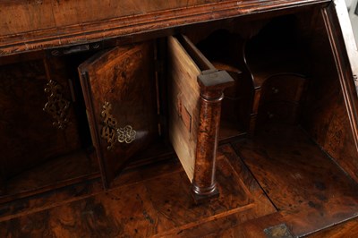 Lot 1539 - A GEORGE I BURR WALNUT BUREAU BOOKCASE WITH BROKEN ARCH PEDIMENT AND MIRRORED DOORS