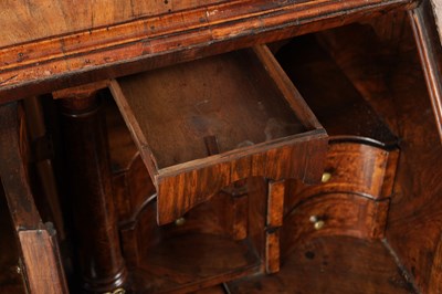 Lot 1539 - A GEORGE I BURR WALNUT BUREAU BOOKCASE WITH BROKEN ARCH PEDIMENT AND MIRRORED DOORS