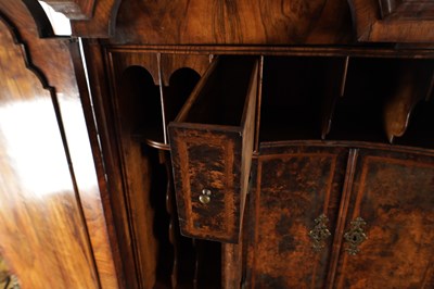 Lot 1539 - A GEORGE I BURR WALNUT BUREAU BOOKCASE WITH BROKEN ARCH PEDIMENT AND MIRRORED DOORS