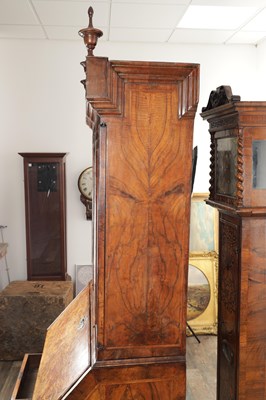 Lot 1539 - A GEORGE I BURR WALNUT BUREAU BOOKCASE WITH BROKEN ARCH PEDIMENT AND MIRRORED DOORS