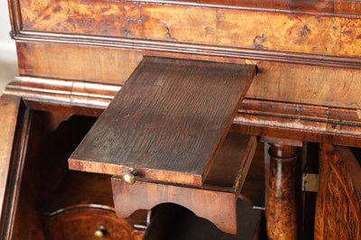 Lot 1539 - A GEORGE I BURR WALNUT BUREAU BOOKCASE WITH BROKEN ARCH PEDIMENT AND MIRRORED DOORS