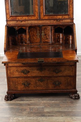 Lot 1539 - A GEORGE I BURR WALNUT BUREAU BOOKCASE WITH BROKEN ARCH PEDIMENT AND MIRRORED DOORS