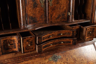 Lot 1539 - A GEORGE I BURR WALNUT BUREAU BOOKCASE WITH BROKEN ARCH PEDIMENT AND MIRRORED DOORS