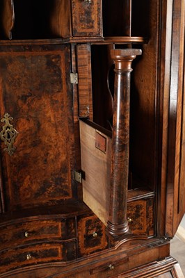 Lot 1539 - A GEORGE I BURR WALNUT BUREAU BOOKCASE WITH BROKEN ARCH PEDIMENT AND MIRRORED DOORS
