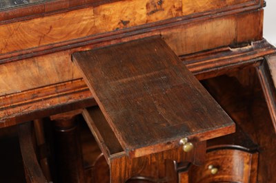 Lot 1539 - A GEORGE I BURR WALNUT BUREAU BOOKCASE WITH BROKEN ARCH PEDIMENT AND MIRRORED DOORS