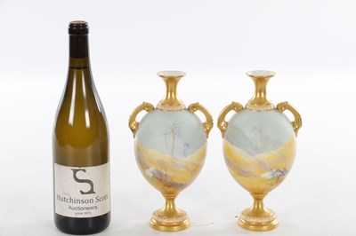 Lot 55 - A FINE PAIR OF EARLY 20TH CENTURY ROYAL WORCESTER PORCELAIN TWIN-HANDLED CABINET VASES BY JOHNSON