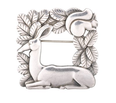 Lot 353 - ARNO MALINOWSKI FOR GEORG JENSEN A STERLING SILVER DEER AND SQUIRREL BROOCH