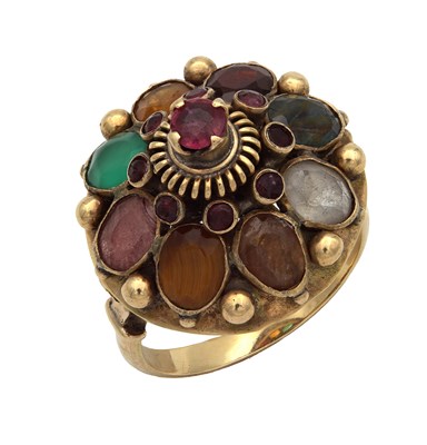 Lot 257 - A 9CT YELLOW GOLD THAI PRINCESS RING WITH CENTRAL RUBY AND MIXED GEMSTONES