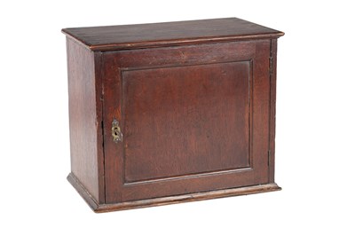 Lot 800 - A MID 18TH CENTURY OAK HANGING SPICE CUPBOARD