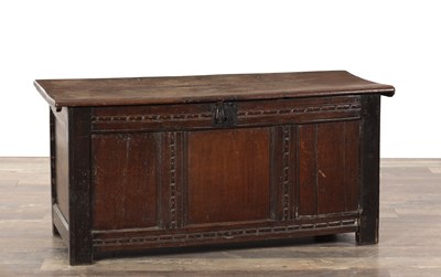 Lot 1415 - A 17TH CENTURY OAK PANELLED FRONT COFFER