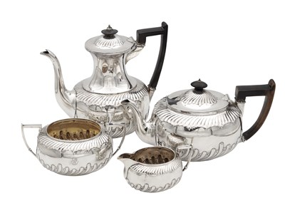 Lot 128 - A VICTORIAN SILVER FOUR-PIECE SILVER TEA SERVICE