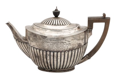 Lot 211 - A REGENCY SILVER TEAPOT