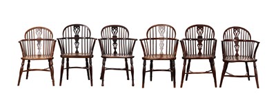 Lot 1391 - A HARLEQUIN SET OF SIX YEW WOOD LOWBACK CROOK ARM WINDSOR CHAIRS