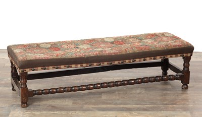 Lot 1460 - AN UNUSUAL 17TH CENTURY OAK LONG STOOL