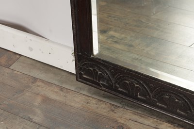 Lot 1511 - AN 18TH CENTURY STYLE CARVED OAK HANGING MIRROR