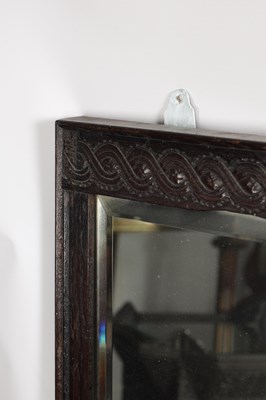 Lot 1511 - AN 18TH CENTURY STYLE CARVED OAK HANGING MIRROR