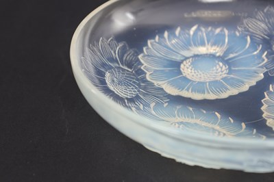 Lot 566 - RENE LALIQUE AN OPALESCENT BLUE STAINED GLASS 'VERNON' DISH