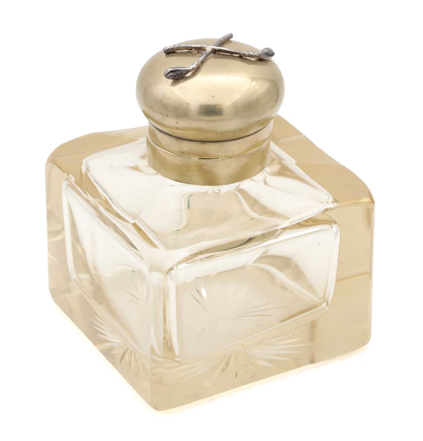 Lot 565 - A VICTORIAN CUT GLASS INKWELL WITH DOMED METAL COVER APPLIED WITH CROSSED GOLF CLUBS