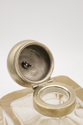Lot 565 - A VICTORIAN CUT GLASS INKWELL WITH DOMED METAL COVER APPLIED WITH CROSSED GOLF CLUBS