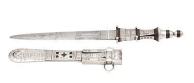Lot 645 - A NORTH AFRICAN SILVER MOUNTED TUAREG DAGGER AND SCABBARD WITH GEOMETRIC ENGRAVING