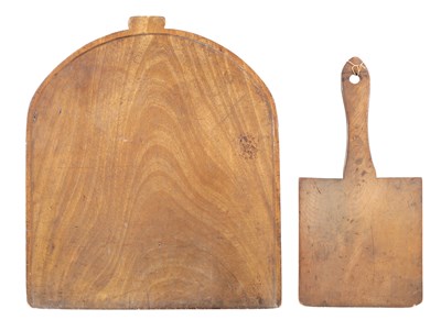 Lot 824 - TWO GEORGIAN MAHOGANY CULINARY IMPLEMENTS A BREAD PADDLE AND A LARGE BOARD