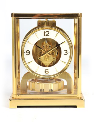 Lot 1200 - A SWISS GILT BRASS AND GLASS ATMOS CLOCK