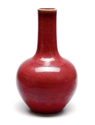 Lot 576 - A CHINESE SANG DE BOEUF GLAZED PORCELAIN BOTTLE VASE