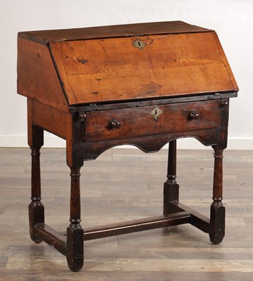 Lot 1530 - A CHARLES II APPLEWOOD BUREAU ON STAND