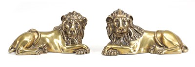 Lot 954 - A PAIR OF 20TH CENTURY BRONZE RECUMBENT LION FIGURES