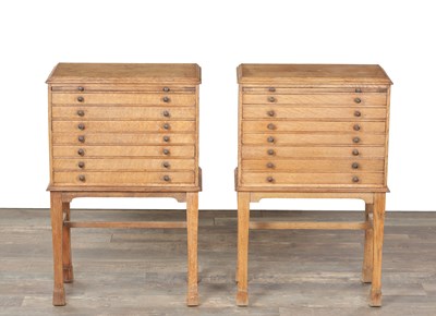 Lot 1413 - A PAIR OF EARLY 20TH CENTURY BLEACHED OAK COLLECTOR'S CABINETS ON STANDS