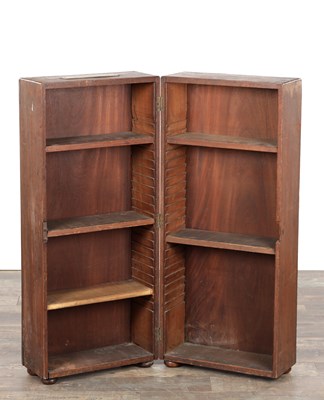 Lot 1370 - AN EARLY 20TH CENTURY CAMPHOR WOOD CAMPAIGN BOOKCASE