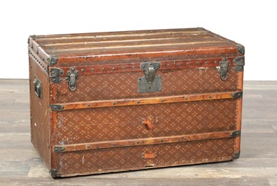 Lot 1373 - A 19TH CENTURY FRENCH PRINTED LEATHER TRAVELLING TRUNK WITH WOOD SLATS AND IRON MOUNTS