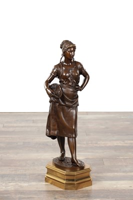 Lot 1063 - CHARLES GEORGES FERVILLE-SUAN A LATE 19TH CENTURY FRENCH PATINATED BRONZE FIGURE OF A YOUNG WOMAN HOLDING A BASKET ON A GILT BRONZE BASE