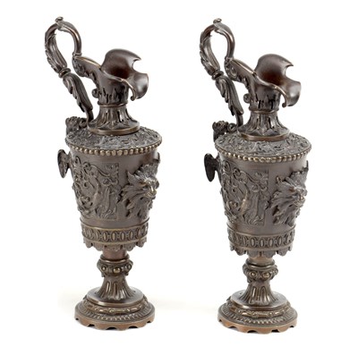 Lot 924 - A PAIR OF 19TH CENTURY FRENCH PATINATED BRONZE URNS WITH LION MASKS