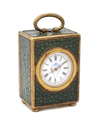 Lot 1209 - A MINIATURE OSTRICH LEATHER AND GILT METAL BOUDOIR CLOCK