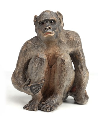Lot 1000 - A 19TH CENTURY AUSTRIAN TERRACOTTA SCULPTURE OF A SEATED MONKEY