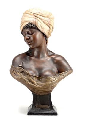 Lot 60 - A LATE 19TH CENTURY GOLDSCHEIDER POLYCHROME TERRACOTTA BUST OF A YOUNG WOMAN WEARING A TURBAN