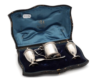Lot 201 - A LATE 19TH CENTURY ENGLISH SILVER CASED THREE PIECE CRUET SET