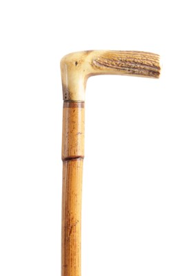 Lot 868 - A 19TH CENTURY ANTLER AND BAMBOO ADJUSTABLE HORSE AND HOUND MEASURING WALKING STICK