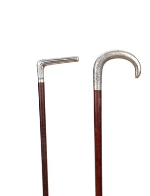 Lot 838 - TWO 19TH CENTURY FRENCH SILVER HANDLED WALKING STICKS