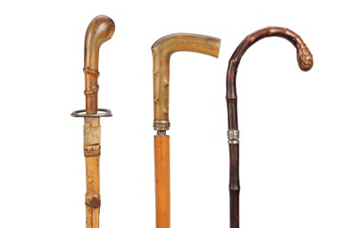 Lot 862 - THREE 19TH CENTURY BAMBOO SWORD STICKS