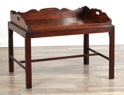 Lot 1401 - A GEORGE III FIGURED MAHOGANY BUTLERS TRAY ON LATER STAND