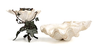 Lot 911 - TWO CLAM SHELLS ONE MOUNTED ON A 20TH CENTURY PATINATED BRONZE STAND